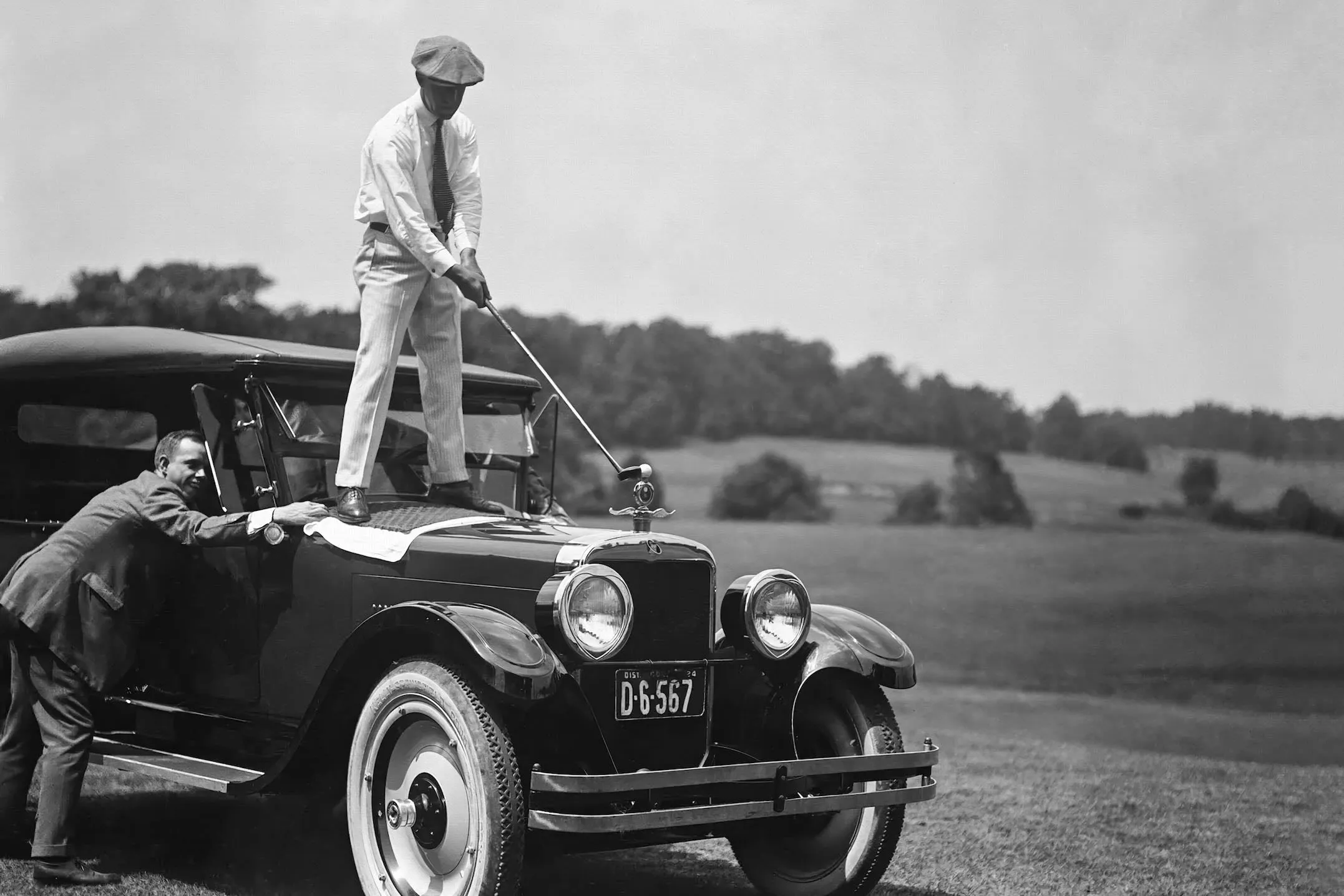 Golf Atop a Car