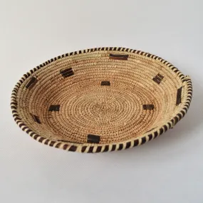 Woven straw and leather plate